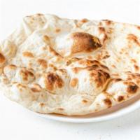 Plain Naan · Indian flatbread made with wheat (maida) and cooked in a tandoor