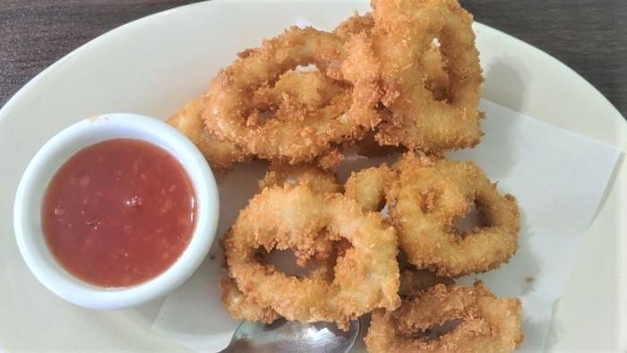 Fried Calamari · Battered squid fried until golden brown served with our sweet chili sauce.