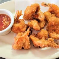 Butterfly Shrimp (6) · Jumbo shrimp battered and fried till crispy served with our sweet chili sauce.