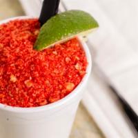 Omg Elotes · Our Elotes topped with hot cheetos.