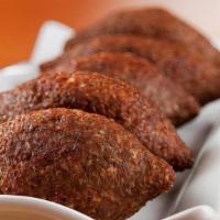 Kibbeh(1 Piece) · Authentic deep fried meat ball stuffed ground beef.(1 piece)