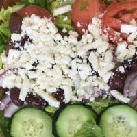 Greek Salad · Chopped romaine lettuce, onions, olives, tomatoes, cucumber, and feta cheese.