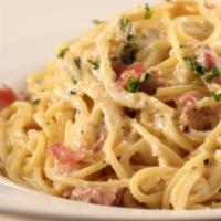 Pappardelle Carbonara · Pancetta, red onions, and homemade Pappardelle pasta swirled in Russo’s homemade Pecorino Ro...