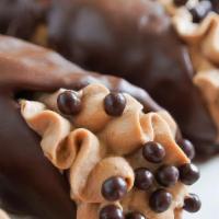 Chocolate Cannoli · Alfredo's chocolate-dipped cannoli is always a guest favorite!