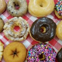 1 Dozen Assorted Donuts · 3 Glazed donuts +3 Chocolate Donuts  + 3 Sprinked Donut or  Icing Donuts + 3Cake