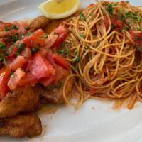 Tim'S Chicken Milanese · Chopped Tomatoes, Capers, Lemon Butter Sauce. Served with Whole Wheat Pasta in Spicy Marinara