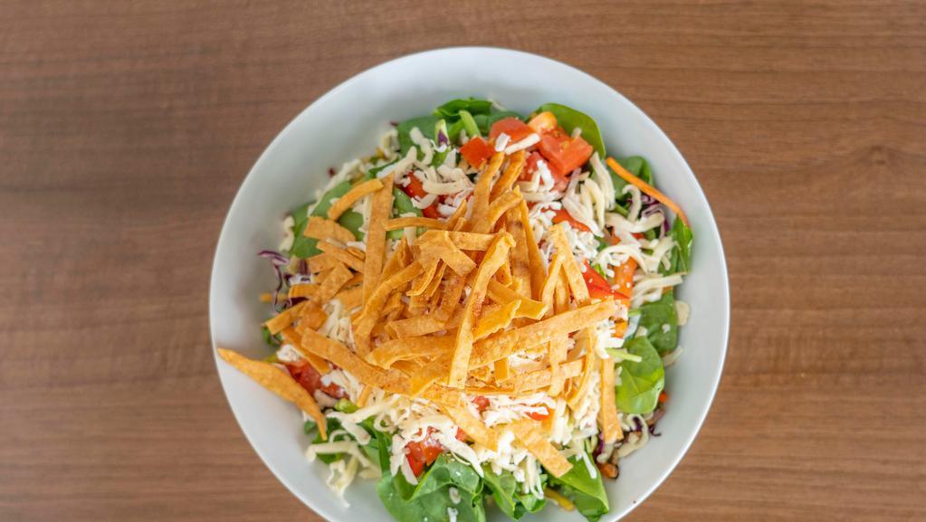 Z'Salad · mixed greens, mixed cheese, bell pepper, tomato, tajin tortilla strips, choice of dressing, with protein.  Steak, tuna and salmon are cooked to order. Consuming raw or  undercooked meats, poultry, seafood, shellfish or eggs may increase may increase your risk of foodborne