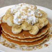 Chub'S Famous Banana Nut Pancakes · Three homemade pancakes made straight from the family recipe, topped with sliced bananas, ch...