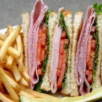 Classic Club Sandwich · Choice of two freshly sliced Turkey, bacon, or freshly smoked ham on three pieces of toast, ...