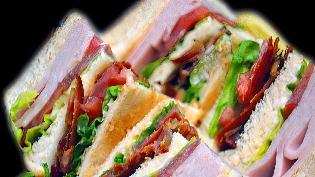 Turkey Club · Texas toast, with mayo, lettuce, tomatoes, bacon, Lays potato chips on top.
