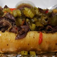 Italian Beef · Piled high on French roll with Hot Giardiniera and Au ju on the side.