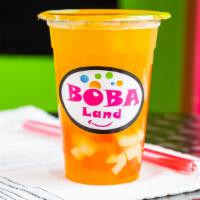 Mango Bubble Tea · Our mango-flavored bubble tea served with chewy tapioca pearls.