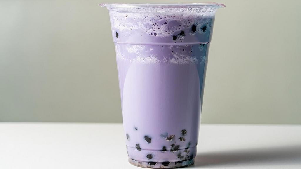 Taro Bubble Tea · Our taro bubble tea served with chewy tapioca.