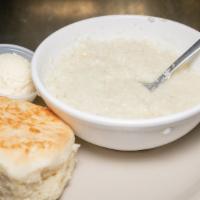 Oatmeal Or Grits · Bowl of warm oatmeal or grits served with your choice of biscuit or toast.