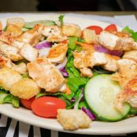 Chicken Salad · Grilled or fried chicken served on top of a large tossed salad.