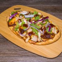 Bbq Chicken Flatbread · Grilled chicken covered in whiskey-soy BBQ sauce and topped with Gouda cheese, red onion, an...