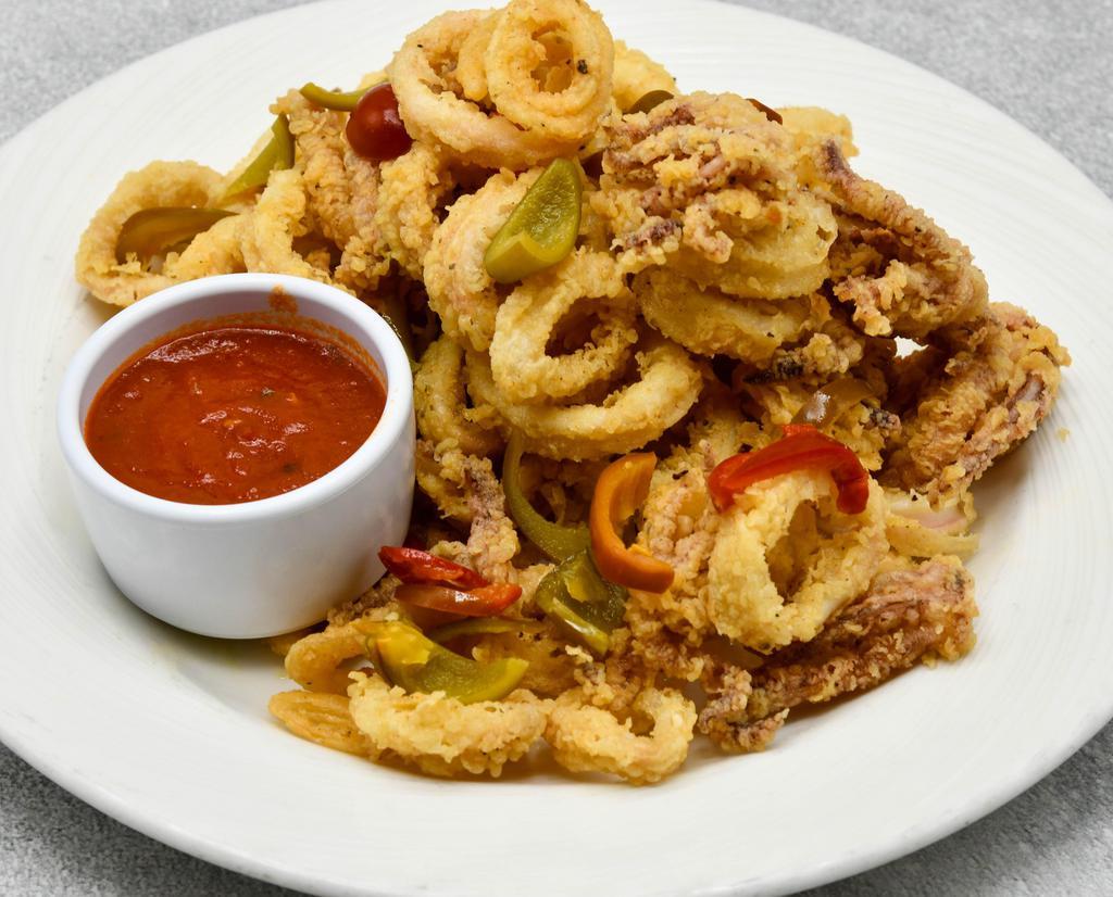 Calamari Fritto Misto · Lightly breaded, tri-colored peppers, cherry peppers, pickled lemon, and marinara.
