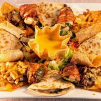 Sampler Platter · Something for everyone! A combo of nachos, quesadillas, flautas, shrimp, brocheta, and a chi...