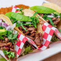 Jumbo Street Tacos · Three corn tacos, with onions, cilantro and slice avocado. Serve with rice and beans.