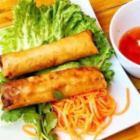 Vietnamese Egg Rolls · Two rolls of pork, shrimp, noodles, and veggies wrapped in crispy egg roll wrapper. Served w...