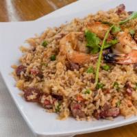 House Special Fried Rice · Includes Chinese BBQ Pork, Chinese Sausage, Peas, Carrots, and topped with Chargrilled Shrimp.
