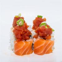 Angel Roll (8Pcs) · Avocado, cucumber, and masago wrapped in soy paper and topped with salmon and spicy tuna