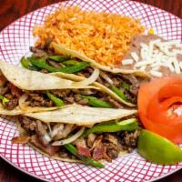 Tacos Duranguense · 3 - Tacos with steak, bacon, onion, jalapeños and cheese