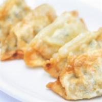 Fried Dumplings 5 Pc · Mandu (dumpling) is made by wrapping mixture of various diced vegetables in a thinly rolled ...