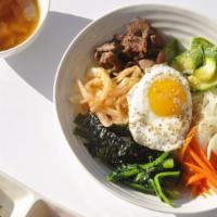 Beef Bulgogi Bibimbap · Bibimbap is a dish made up of steamed rice with various marinated and or cooked vegetables a...