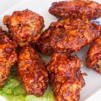 Fried Wings With Sweet Sauce · Chicken wings (8 pc of four wings and four drums) marinated in wheat with several spices, de...