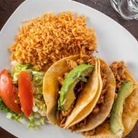 Tacos Mexico · Chicken strips sautéed in adobo lime sauce on three corn tortillas. Served with rice, avocad...