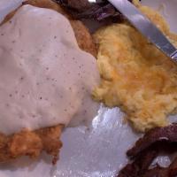 Hen House · Crispy chicken and gravy with 2 eggs any style, your choice of 2 strips of beef bacon or 2 t...