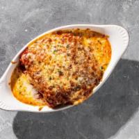 Lasagna Al Forno · Traditional with ground beef, ricotta, parmesan, and mozzarella baked in our housemade marin...