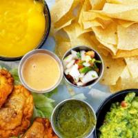 Cascabel Sampler · Enjoy a little taste of everything with this sampler! Queso, Guac, side of GF chips, 3 Chori...