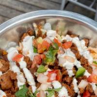 Burrito Bowl · Bowl with your choice of rice, beans and protein. Comes with lettuce, pico de gallo and crem...
