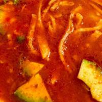 Tortilla Soup · Spicy. Gluten free. Made with jackfruit Tinga, tortilla chips, and seasoned potato cubes in ...