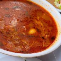 Menudo · A traditional Mexican soup; made with hominy & seasoned to
perfection jackfruit in a Cascabe...