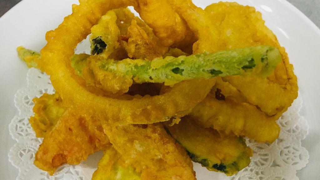 Shrimp & Vegetable Tempura · Se style battered two pieces shrimp and vegetable tempura served with tempura.