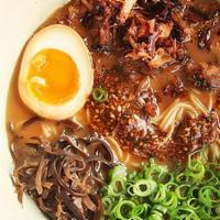 Miso Ramen · Miso flavored ramen noodle soup with half egg and roasted pork.