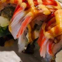 Temptation · Shrimp tempura, cheese, avocado, topped with crab stick, eel sauce, and spicy mayo.