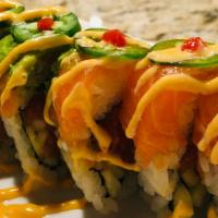 Hot Kiss · Spicy tuna roll topped with salmon, avocado, jalapeno, served with spicy mayo and hot sauce.
