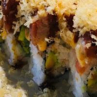 Firecracker · Shrimp tempura, crabmeat, avocado, cucumber roll topped with spicy tuna, crunch flakes, and ...