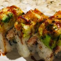 Hulk · Shrimp, Cream cheese, avocado, crabmeat, topped with crawfish and eel sauce.