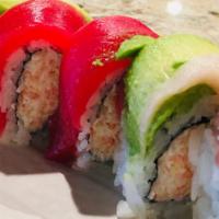 Rainbow · California roll topped with tuna, salmon, yellowtail, white tuna, and avocado.