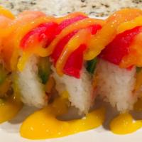 Cherry Blossom · Crabmeat, cucumber, mango roll topped with tuna and fresh salmon with mango sauce.