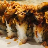 Dark Samurai · Shrimp tempura, spicy crab roll topped with unagi, avocado, spicy mayo, eel sauce, and srira...