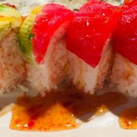 Flaming Mango · Crab, mango, and avocado, wrapped in soy paper, topped with bluefin tuna, and sweet chili sa...
