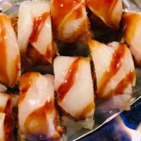 Phoenix · Shrimp tempura, spicy crab, and cucumber, topped with spicy tuna, super white tuna, cherry s...