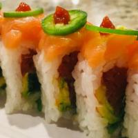 Samba · Spicy tuna, crabmeat, seaweed salad, cucumber, and avocado, wrapped with soy paper, topped w...