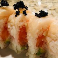 Samurai · Fresh salmon, cream cheese, avocado, and crabmeat, wrapped in soy paper, topped with super w...